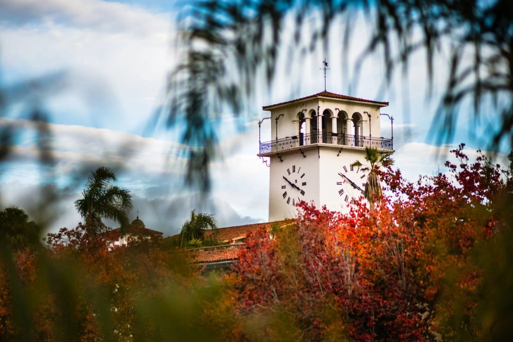 Life gallery: the Santa Barbara County Courthouse clock tower framed by red foliage